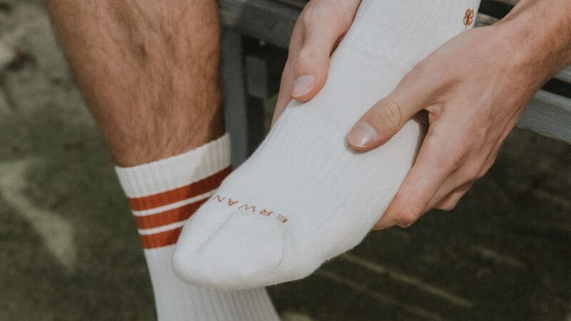 person wearing white nike socks